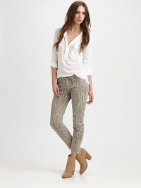 Skinny-fit denim goes beyond the blues in this chic, printed wash, this season's must-have look.THE FITCropped above ankleRise, about 8Inseam, about 27THE DETAILSZip flyFive-pocket style98% cotton/2% elastaneMachine washMade in USA of imported fabricModel shown is 5'10 (177cm) wearing US size 4. Skinny-fit denim goes beyond the blues in this chic, printed wash, this season's must-have look.THE FITCropped above ankleRise, about 8Inseam, about 27THE DETAILSZip flyFive-pocket style98% cotton/2% elastaneMachine washMade in USA of imported fabricModel shown is 5'10 (177cm) wearing US size 4.