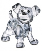 The embodiment of Scamp, this Swarovski crystal figurine captures the rascally spirit of Lady and the Tramp's young pup. A must for Disney and dog lovers in lavender-tinted crystal.