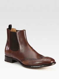 Everyday style and comfort, crafted in rich Italian leather with perforated detail across the toe.Ankle pull tabLeather upperLeather liningLeather soleMade in Italy Everyday style and comfort, crafted in rich Italian leather with perforated detail across the toe.Ankle pull tabLeather upperLeather liningLeather soleMade in Italy