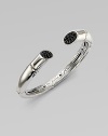 From the Bamboo Collection. A medium cuff accented with black sapphire adorned ends. Black sapphiresSterling silverKick mechanism closureDiameter, about 2¼Imported 
