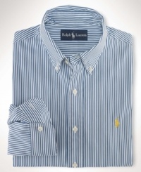 A trim-fitting long-sleeved shirt is crafted from silky cotton poplin in a bold striped pattern. A trim-fitting long-sleeved shirt is crafted from silky cotton poplin in a bold striped pattern.