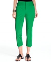 A clean, wide waistband and welt pockets give INC's petite cropped pants sleek minimalist appeal. A clean, wide waistband and welt pockets give INC's petite cropped pants sleek minimalist appeal.