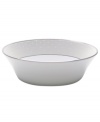 A modern shape and everyday size make this beautiful bowl handy for any meal. The Pointe d'Esprit pattern captures the effervescence of celebration, with raised dots that flow from platinum-rimmed edges like a shower of confetti.