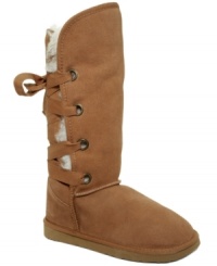 Furry wool peeks out from behind the lace-up straps along the shaft of Ukala's Pippa tall boots, making these boots the epitome of cozy style. Furry wool peeks out from behind the lace-up straps along the shaft of Ukala's Pippa tall boots, making these boots the epitome of cozy style.