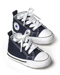 Classic high top Converse sneakers with soft soles for a comfortable fit. Great for gift giving with signature box packaging. Classic high top Converse sneakers with soft soles for a comfortable fit. Great for gift giving with signature box packaging.