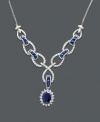 Let waves of diamond and sapphire unfurl at your neckline. This unique necklace features round and oval-cut sapphire (2 ct. t.w.) and round-cut diamond (1/2 ct. t.w.). Set in 14k white gold. Approximate length: 15 inches. Approximate drop: 1-1/4 inches.