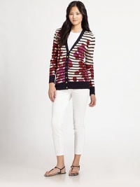 Sporty stripes and a pretty petal pattern lend this knit design a distinctive style.V necklineLong sleevesRib-knit cuffs and hemButton frontAbout 26½ from shoulder to hem48% linen/37% viscose/15% nylonDry cleanImportedModel shown is 5'10 (177cm) wearing US size Small. Sporty stripes and a pretty petal pattern lend this knit design a distinctive style.V necklineLong sleevesRib-knit cuffs and hemButton frontAbout 26½ from shoulder to hem48% linen/37% viscose/15% nylonDry cleanImportedModel shown is 5'10 (177cm) wearing US size Small.