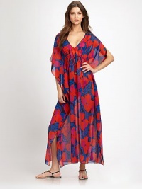 In living color, an airy, maxi dress with feminine, flutter sleeves and flattering, drawstring ties.Deep v-necklineSplit, flutter sleevesDrawstring Empire waistEngraved cord endsSilkDry cleanImported