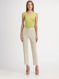The ideal wardrobe staple, in soft, finespun stretch cotton.V neckline with crossover detailSleevelessCotton/elastaneDry cleanImported of Swiss fabricModel shown is 5'10 (177cm) wearing US size 4. The ideal wardrobe staple, in soft, finespun stretch cotton.V neckline with crossover detailSleevelessCotton/elastaneDry cleanImported of Swiss fabricModel shown is 5'10 (177cm) wearing US size 4.
