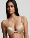 A soft and sleek racerback bra with logo detail along underside of straps.
