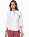 A breezy cotton voile shirt is finished with delicate eyelet trim for a bohemian-inspired look.