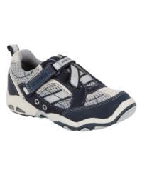Time to flex! He'll stay on top of his game with these Stride Rite sneakers made with air technology and forefoot grooves for optimal comfort. Time to flex! He'll stay on top of his game with these Stride Rite sneakers made with air technology and forefoot grooves for optimal comfort.