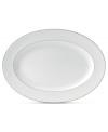 A brighter white. Royal Doulton's Finsbury oval platter embodies chic minimalism, swept with a pretty white-on-white pattern and bands of pewter gray. Versatile bone china proves a smart choice for every day as well as entertaining.