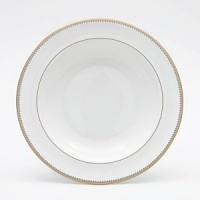 Rings of gold adorn fine white bone china with the lustrous shine of a wedding band. White bone china features two different border trims of gold, a wide corded border of textured grosgrain ribbon on some pieces, a narrow edge on others. Rings of gold adorn fine white bone china with the lustrous shine of a wedding band. White bone china features two different border trims of gold, a wide corded border of textured grosgrain ribbon on some pieces, a narrow edge on others.