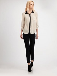 The lightweight chiffon button-front, edged with contrast trim for a touch of bold, colorblocked style.Point collarRoll-tab sleevesButton frontAbout 25 from shoulder to hemRayonDry cleanImportedModel shown is 5'10 (177cm) wearing US size Small. The lightweight chiffon button-front, edged with contrast trim for a touch of bold, colorblocked style.Point collarRoll-tab sleevesButton frontAbout 25 from shoulder to hemRayonDry cleanImportedModel shown is 5'10 (177cm) wearing US size Small.