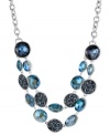Getting the blues is a good thing with this two-row necklace from Kenneth Cole New York. Crafted from silver-tone mixed metal, the necklace dazzles with blue faceted glass beads and concave discs with stones of that same color. Approximate length: 17 inches + 3-inch extender. Approximate drop: 1-3/4 inches.