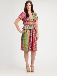 Watercolor hues flawlessly combine with on-trend peplum to create your new favorite dress. The Empire waist defines the shape creating a perfectly feminine silhouette.Ruffle necklineShort sleevesBust dartsEmpire waistAbout 25 from natural waist60% silk/40% polyesterDry cleanMade in USA of imported fabric Watercolor hues flawlessly combine with on-trend peplum to create your new favorite dress. The Empire waist defines the shape creating a perfectly feminine silhouette.Ruffle necklineShort sleevesBust dartsEmpire waistAbout 25 from natural waist60% silk/40% polyesterDry cleanMade in USA of imported fabric