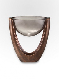 Forget the coaster or trivet: this ingenious design features a bronze-finish alloy structure that holds a glass bowl in mid-air suspension. From the Heritage Pebble CollectionAntique copper-plated alloy with glass plates11W X 6 H X 12DHand wash Imported