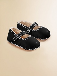 A cozy take on the traditional Mary Janes, this pair is ultra stylish and comfortable with contrast stitching and superb sheepskin. Grip-tape strap closure Lambskin upper Sheepskin insole Imported A cozy take on the traditional Mary Janes, this pair is ultra stylish and comfortable with contrast stitching and superb sheepskin. Grip-tape strap closure Lambskin upper Sheepskin insole Imported