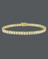 Add an element of luxury to your look with a luminous bracelet. B. Brilliant design features a row of round-cut, channel-set cubic zirconias (10 ct. t.w.) set in 18k gold over sterling silver. Approximate length: 7-1/4 inches.