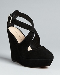 Loeffler Randall wedges sophisticated style into a must-have basic, with elegant criss-cross straps in plush suede. Loeffler Randall wedges sophisticated style into a must-have basic, with elegant criss-cross straps in plush suede.