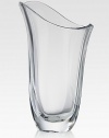 Smooth, fluid lines wrap around this stunning vase of fine crystal. 12 highHand washImported