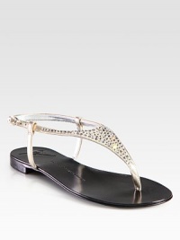 Pearly metallic leather thong sandal has an adjustable slingback strap and crystal-encrusted upper. Crystal-embellished metallic leather upperLeather lining and soleMade in ItalyOUR FIT MODEL RECOMMENDS ordering true size. Pearly metallic leather thong sandal has an adjustable slingback strap and crystal-encrusted upper. Crystal-embellished metallic leather upperLeather lining and soleMade in ItalyOUR FIT MODEL RECOMMENDS ordering true size.