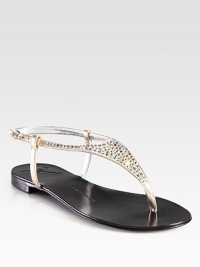 Pearly metallic leather thong sandal has an adjustable slingback strap and crystal-encrusted upper. Crystal-embellished metallic leather upperLeather lining and soleMade in ItalyOUR FIT MODEL RECOMMENDS ordering true size. 