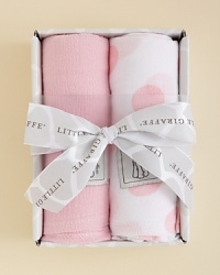 Swaddle, snuggle and shade with this pair of soft muslin blankets. Swaddle, snuggle and shade with this pair of soft muslin blankets.