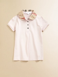 A checked, ruffled collar decorates this piqué polo style.Ruffled Peter Pan collarFront button placketShort sleeves95% cotton/5% elastaneMachine washImportedPlease note: Pattern may vary. A checked, ruffled collar decorates this piqué polo style.Ruffled Peter Pan collarFront button placketShort sleeves95% cotton/5% elastaneMachine washImportedPlease note: Pattern may vary.