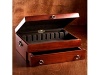 Simple, yet elegant, this stunning Silver Chest will protect your silver for generations to come. Crafted by the artisans of Reed & Barton, this spacious chest holds 130 pieces, including spreaders. The lid's interior features a racking system for knives and serving pieces. Chest measures 15-3/4x11-3/4x3-1/2 and is fully lined with tarnish-preventative silver cloth. Detailed with solid brass inplates. Made in USA.