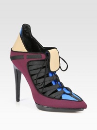 Point toe ankle boot with colorblock neoprene panels, lace-up front and suede trim. Stacked heel, 4¾ (120mm)Island platform, ½ (15mm)Compares to a 4¼ heel (110mm)Neoprene and grosgrain upper with suede trimPoint toeLeather lining and solePadded insoleMade in Italy Point toe ankle boot with colorblock neoprene panels, lace-up front and suede trim. Stacked heel, 4¾ (120mm)Island platform, ½ (15mm)Compares to a 4¼ heel (110mm)Neoprene and grosgrain upper with suede trimPoint toeLeather lining and solePadded insoleMade in Italy