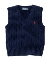 The essential sweater vest is a handsome layer rendered in durable cable-knit cotton.