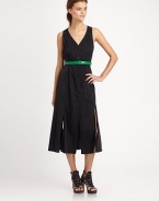 Silk-rich v-neck in a sophisticated, lengthy silhouette, finished with a button front, contrasting leather belt and plethora of sultry slits. Button frontDetachable leather beltSide and back slitsAbout 30 from natural waist61% silk/39% cottonDry cleanImportedModel shown is 5'10 (177cm) wearing US size 2.