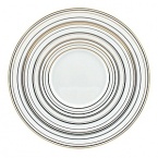 Inspired by Milleraies, Raynaud's spearhead tableware set, Attraction boasts a freer, more modern design with alternating narrow and wide stripes. It will embellish any table with its shades of pink and red, enhanced with mauve and orange and underscored subtle shades of green and brown.