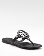 The highlight of this leather thong is the polished, metal logo.Screw detail Leather lining Padded insole Rubber sole ImportedOUR FIT MODEL RECOMMENDS ordering true size. 