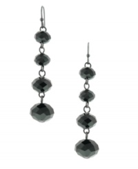 A refined line: With their long, lean silhouette, 2028's linear drop earrings epitomize elegance. Crafted in hematite tone mixed metal with black plastic beads. Approximate drop: 2 inches. A refined line: With their long, lean silhouette, 2028's linear drop earrings epitomize elegance. Crafted in hematite tone mixed metal with black plastic beads. Approximate drop: 2 inches.
