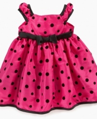 Polka dots sweeten up her party-time look with this precious dress from Penelope Mack. Polka dots sweeten up her party-time look with this precious dress from Penelope Mack.