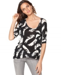 An allover feather print adds an irreverent appeal to this boxy Kensie top -- perfect over the season's skinny jeans! An allover feather print adds an irreverent appeal to this boxy Kensie top -- perfect over the season's skinny jeans!