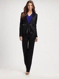 Stretch wool sateen in a slim-fit silhouette, cinched with a double-wrap leather belt.Notched lapelFront hook-and-eye closureWelt pocketLong slim-fit sleevesSide flap pocketsIncluded leather beltSingle back ventSilk liningAbout 26 from shoulder to hem96% wool/3% polyamide/1% elastaneDry cleanMade in ItalyModel shown is 5'11 (180cm) wearing US size 4 Additional Information Women's Premier Designer & Contemporary Size Guide 