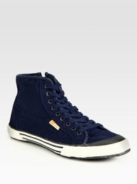 Mid-top silhouette with a cool, downtown vibe crafted in a rich canvas upper with iconic logo detail.Canvas upperPadded insoleRubber soleImported Mid-top silhouette with a cool, downtown vibe crafted in a rich canvas upper with iconic logo detail.Canvas upperPadded insoleRubber soleImported