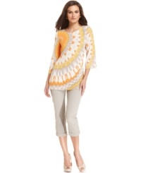 A bright sunburst print makes this Alfani tunic a perfect pick for sunny summer style! A bright sunburst print makes this Alfani tunic a perfect pick for sunny summer style!