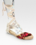 Stretchy linen upper in a classic print, topped with textured hemp and grosgrain ribbon that ties up the calf. Grosgrain ribbon, printed linen and hemp upperHemp liningRubber soleImportedOUR FIT MODEL RECOMMENDS ordering true whole size; ½ sizes should order the next whole size down. 