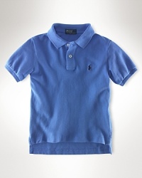 Essential short-sleeved polo shirt in breathable cotton mesh. Ribbed polo collar and armbands. Uneven vented hem. Signature embroidered pony accents the chest. Essential short-sleeved polo shirt in breathable cotton mesh. Ribbed polo collar and armbands. Uneven vented hem. Signature embroidered pony accents the chest.