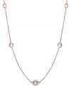 Layer yourself with inches of sparkle. This delicate necklace is crafted in 14k rose gold over sterling silver, with round-cut white topaz stations (4 ct. t.w.). Approximate length: 17 inches.