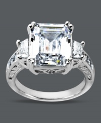 An engagement-style ring at an affordable price! This divine Arabella style highlights a large emerald-cut Swarovski zirconia (12-9/10 ct. t.w.) decorated with sparkling side accents. Crafted in sterling silver. Size 7. An engagement-style ring at an affordable price! This divine Arabella style highlights a large emerald-cut Swarovski zirconia (12-9/10 ct. t.w.) decorated with sparkling side accents. Crafted in sterling silver. Size 7.