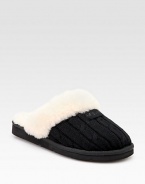 Warm and comfy wool design with shearling lining. Wool knit upper Shearling lining Padded insole Rubber sole ImportedOUR FIT MODEL RECOMMENDS ordering true whole size; ½ sizes should order the next whole size up. 