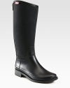 A twist on Hunter's classic rain boot, with an equestrian-style silhouette, nylon shaft and gleaming goldtone hardware.Rubber heel, 1¼ (30mm)Shaft, 14¾Leg circumference, 14Rubber and nylon upperBack zip with snap closureNylon liningRubber solePadded insoleImported