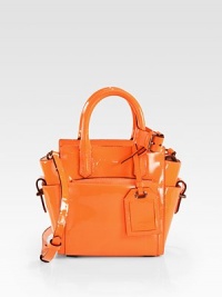 A versatile top-handle satchel offering stunning glamour, thanks to its patent-leather fabrication.Detachable adjustable top handle, 4 dropDetachable adjustable shoulder strap, 21-22½ drop Top zip closureThree outside open pocketsOne outside detachable pouchOne inside zip pocketTwo inside open pocketsCotton liningFully lined10½W X 9H X 4DImported A versatile top-handle satchel offering stunning glamour, thanks to its patent-leather fabrication.Detachable adjustable top handle, 4 dropDetachable adjustable shoulder strap, 21-22½ drop Top zip closureThree outside open pocketsOne outside detachable pouchOne inside zip pocketTwo inside open pocketsCotton liningFully lined10½W X 9H X 4DImported