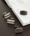 Rise to the occasion with these sophisticatedly simple, yet intriguingly complex cufflinks. Raised, brushed metal faces have a subtle shine and solid black accent (or contrast stripe) along the center. 0.75 x .5